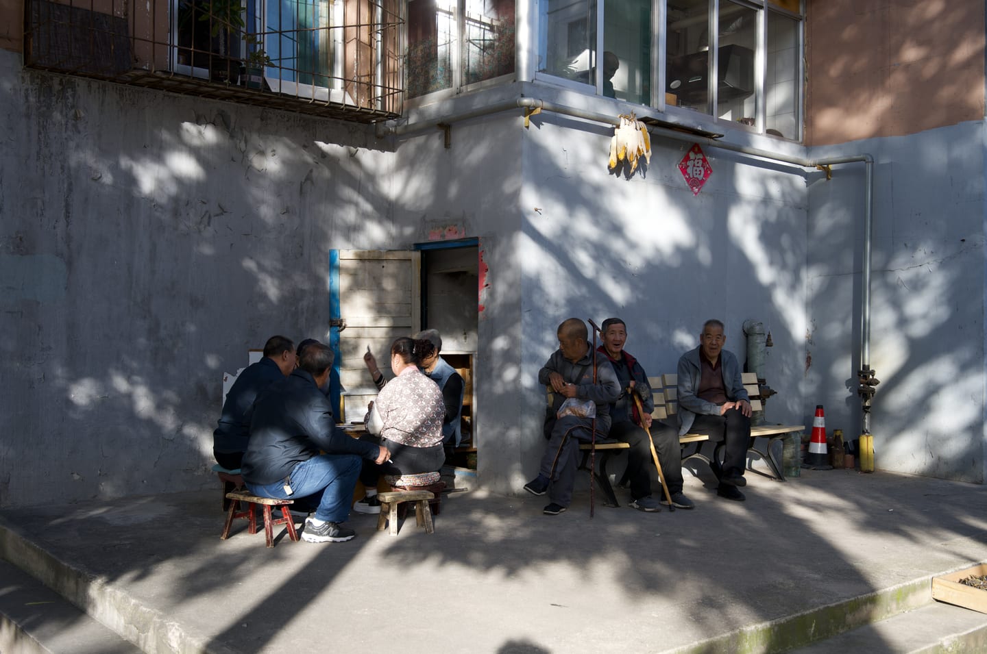 The same courtyard as the camera's RAW decode.